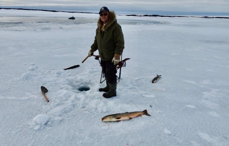 Image: Reel in Luck: Canada's Thrilling Ice Fishing Casino Game Experience